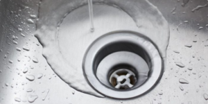 Clogged Drains? When To Call a Professional