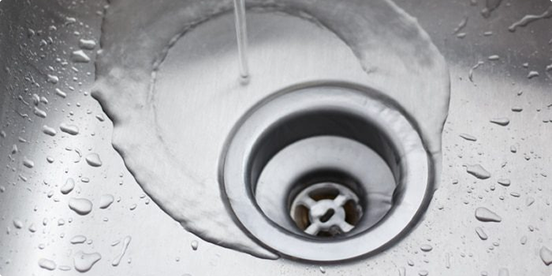 Clogged Drains? When To Call a Professional
