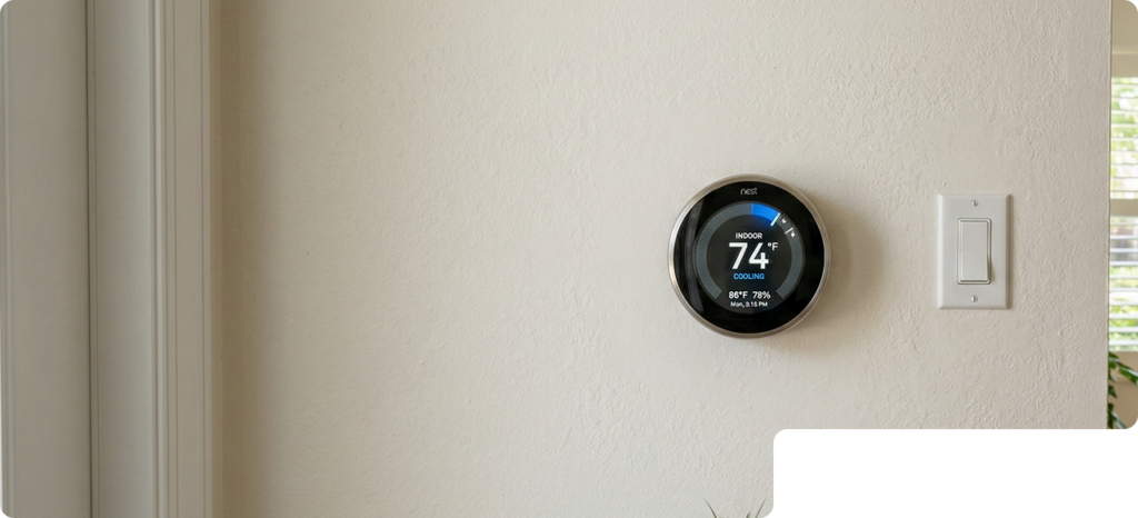 Smart Nest Thermostat Installed On Home Wall At Southwest Florida