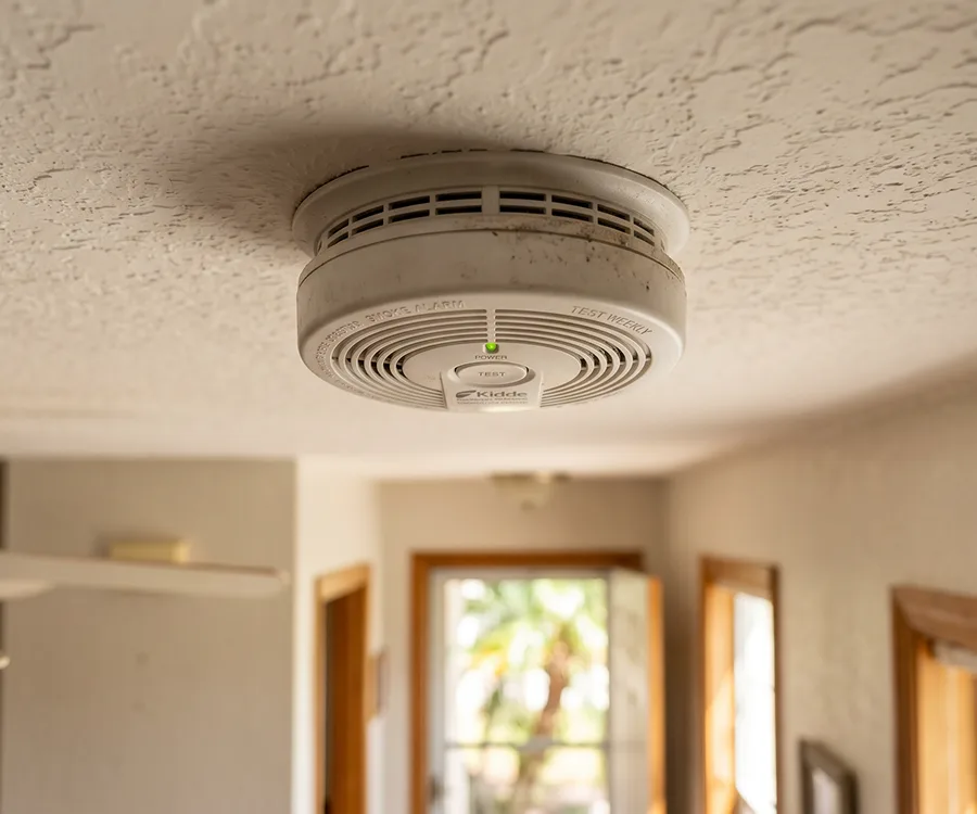 Electrician Installing Double Electrical Outlet In Southwest Florida
